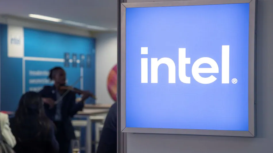 Intel lowers its full-year profit forecast and plans layoffs as the company ramps its sales into data centers.